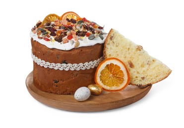 Photo of Traditional Easter cake with dried fruits and decorated eggs on white background