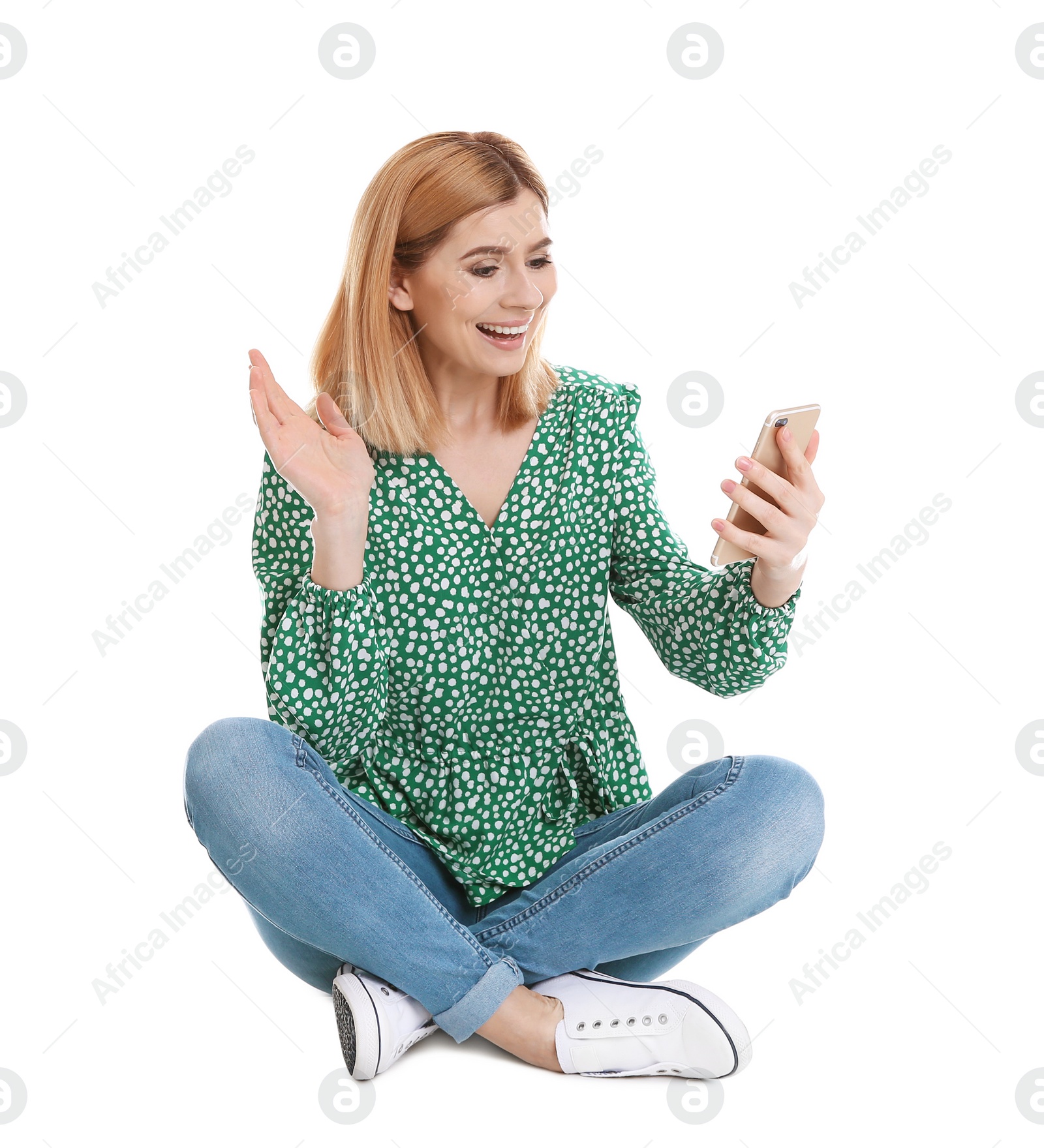 Photo of Woman using mobile phone for video chat isolated on white