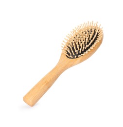 Photo of One new wooden hairbrush isolated on white