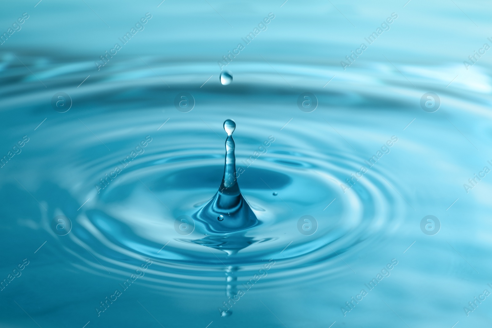 Photo of Splash of clear water with drops as background, closeup