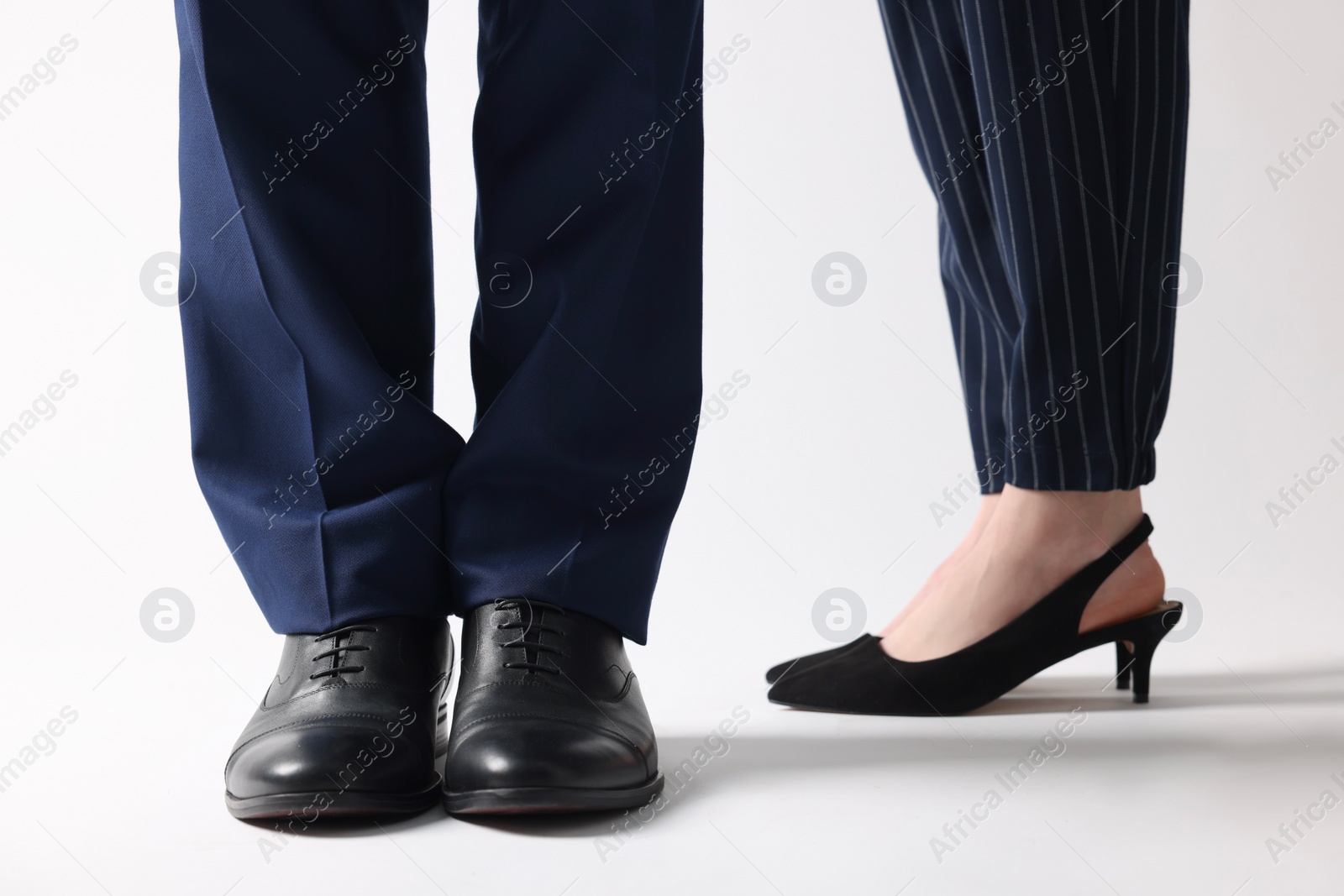 Photo of Businesswoman and businessman on white background, closeup