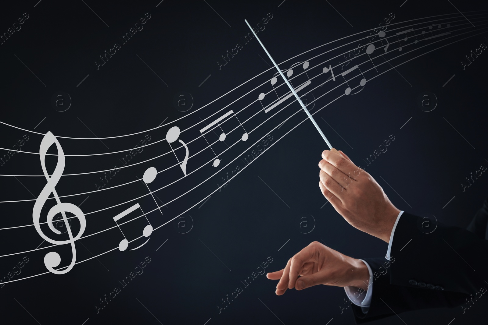 Image of Conductor with baton and music notes on dark background, closeup