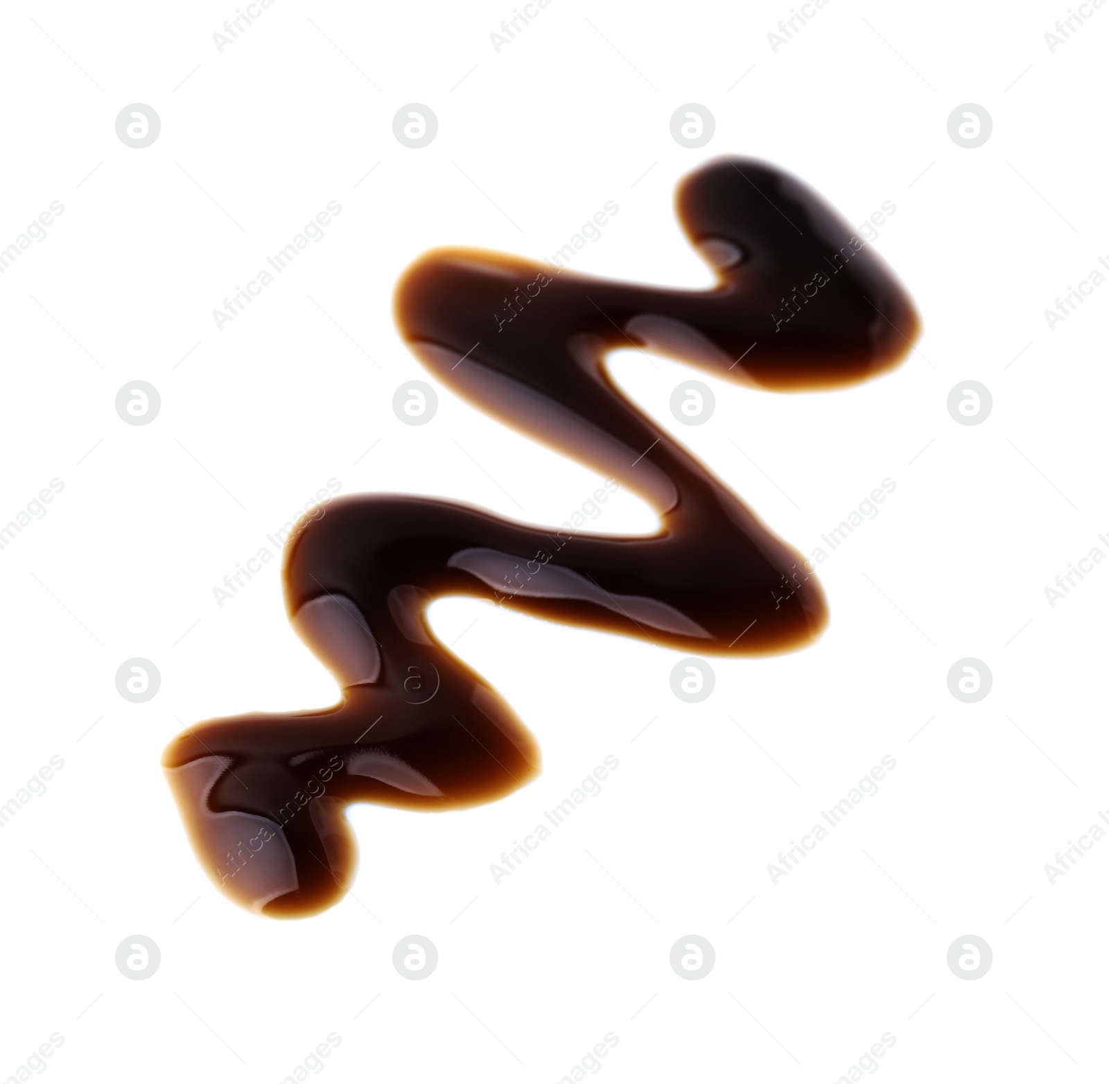 Photo of Balsamic glaze on white background. Salad dressing