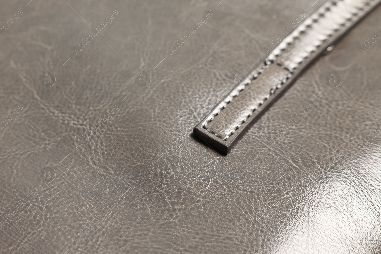 Photo of Natural leather with seams as background, closeup view