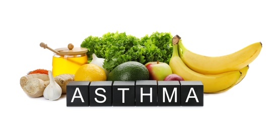 Natural products and cubes with space for text on white background. Home remedies for asthma