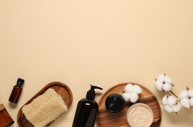 Bath accessories. Flat lay composition with personal care products on beige background, space for text