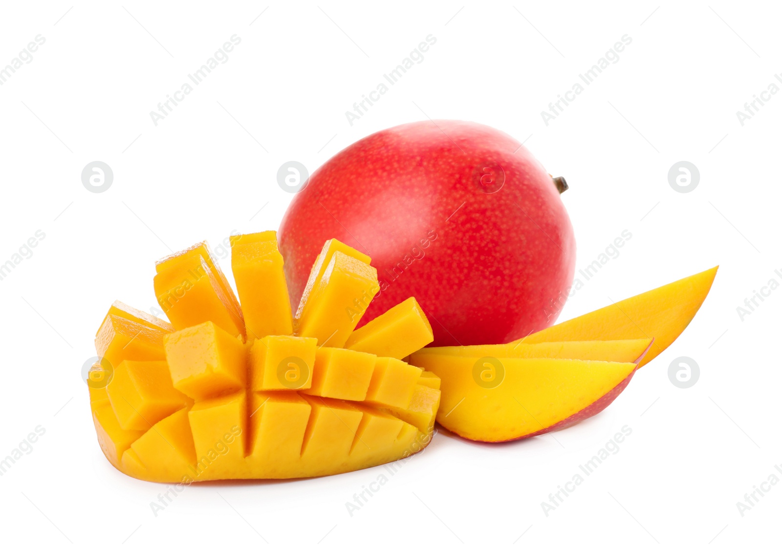 Photo of Whole and cut ripe mangoes isolated on white. Exotic fruit