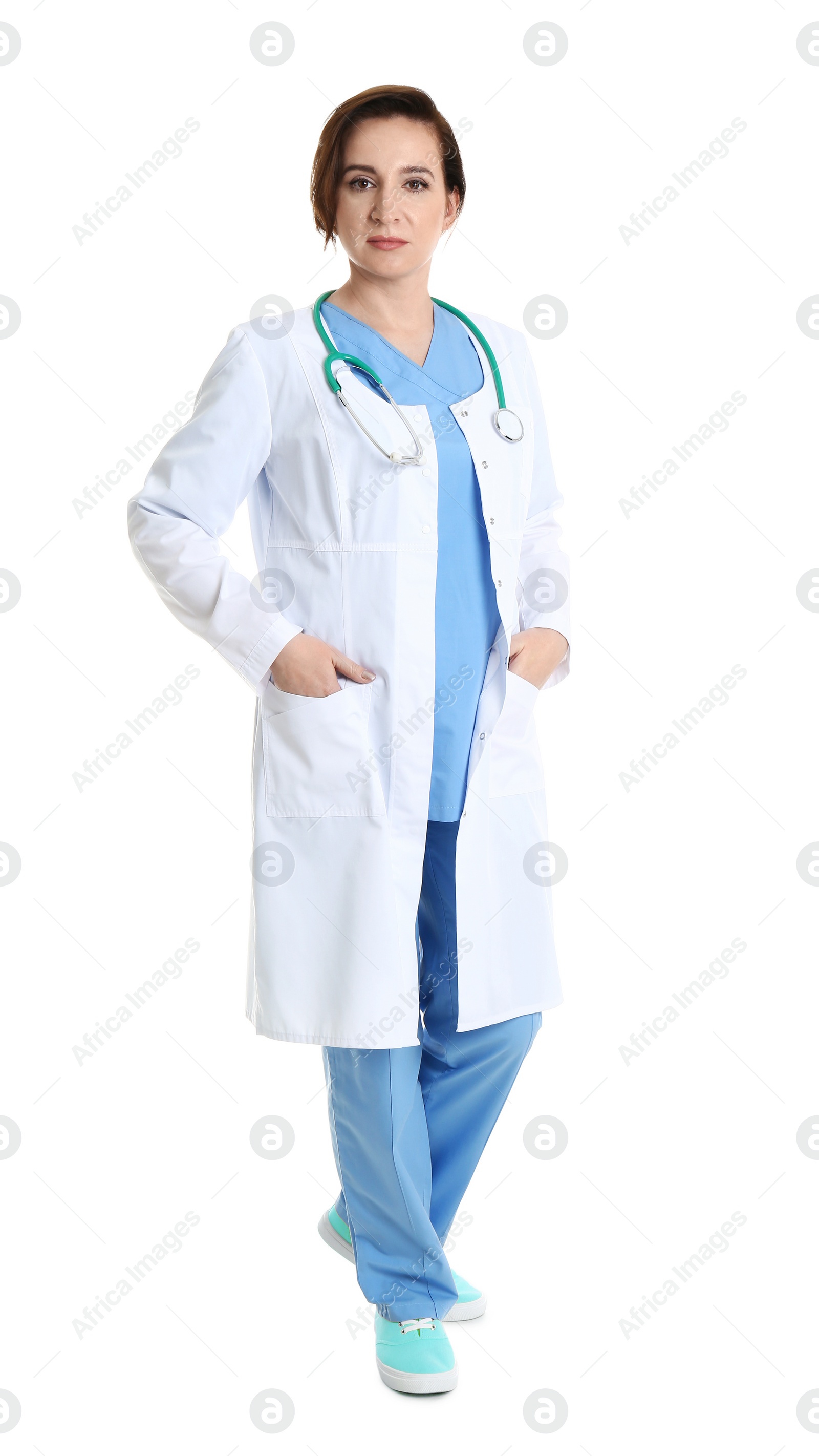 Photo of Full length portrait of experienced doctor in uniform on white background. Medical service