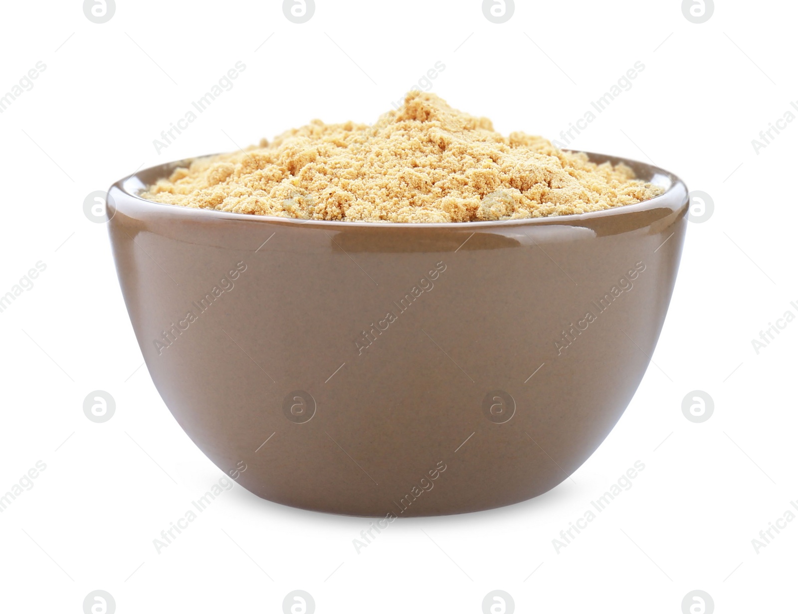 Photo of Aromatic mustard powder in bowl on white background