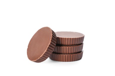 Photo of Delicious peanut butter cups on white background