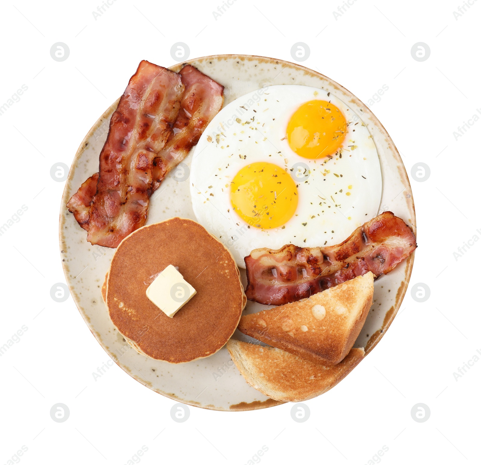 Photo of Tasty pancakes with fried eggs and bacon isolated on white, top view