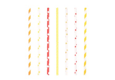 Image of Set of colorful paper drinking straws on white background