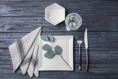 Photo of Stylish elegant table setting on wooden background, top view