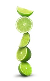 Image of Many stacked cut limes on white background