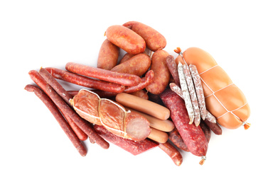 Photo of Different tasty sausages on white background. Meat product