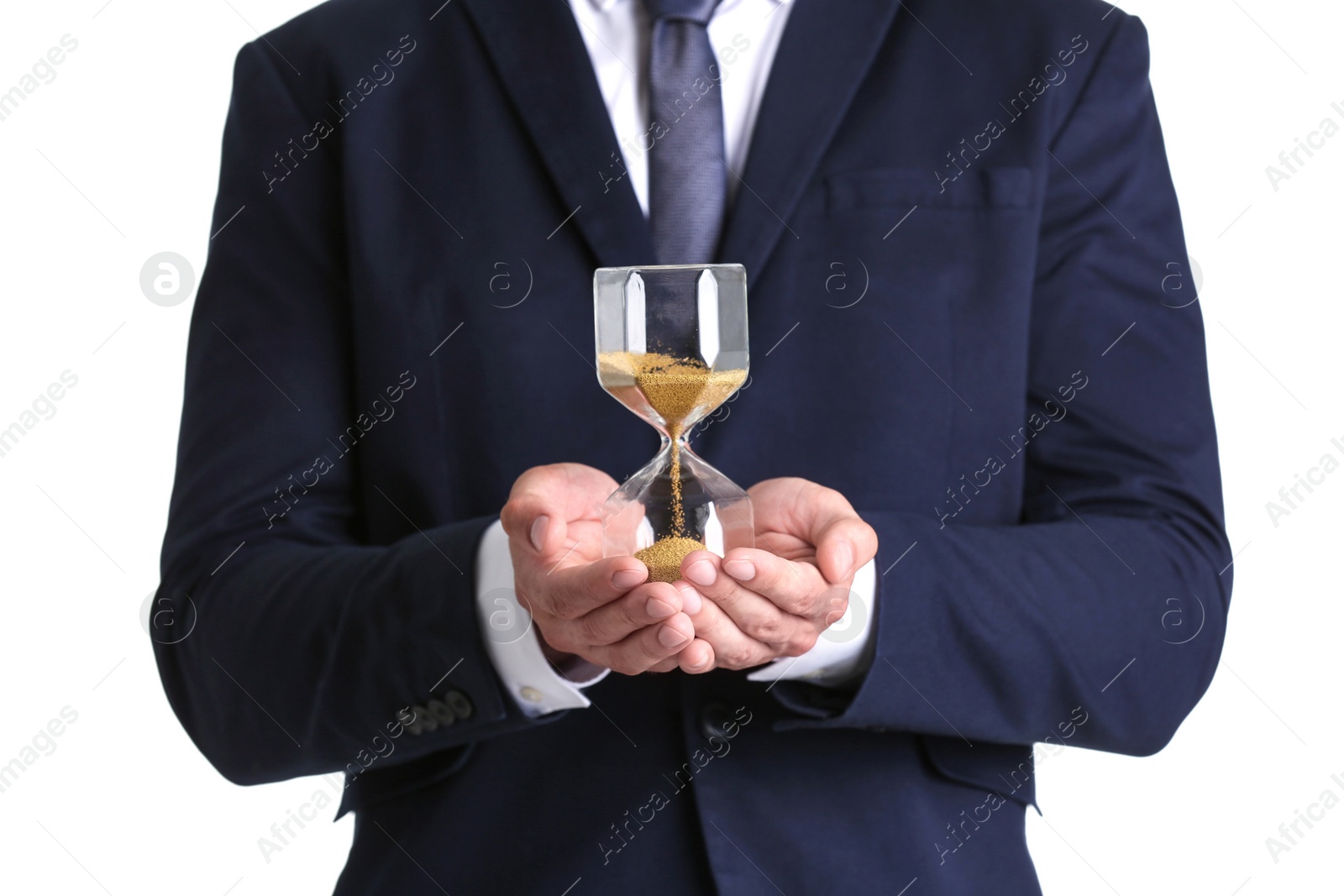 Photo of Businessman holding hourglass on white background. Time concept