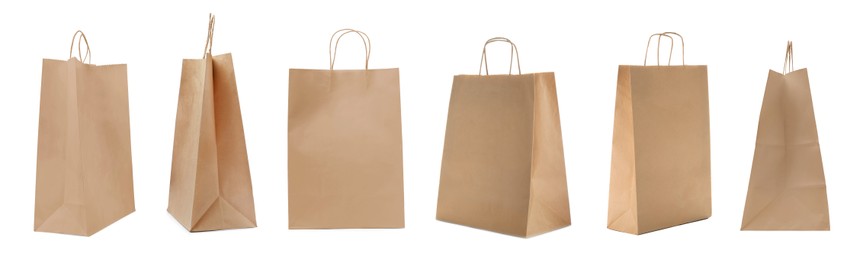 Image of Set with kraft paper bags on white background. Banner design