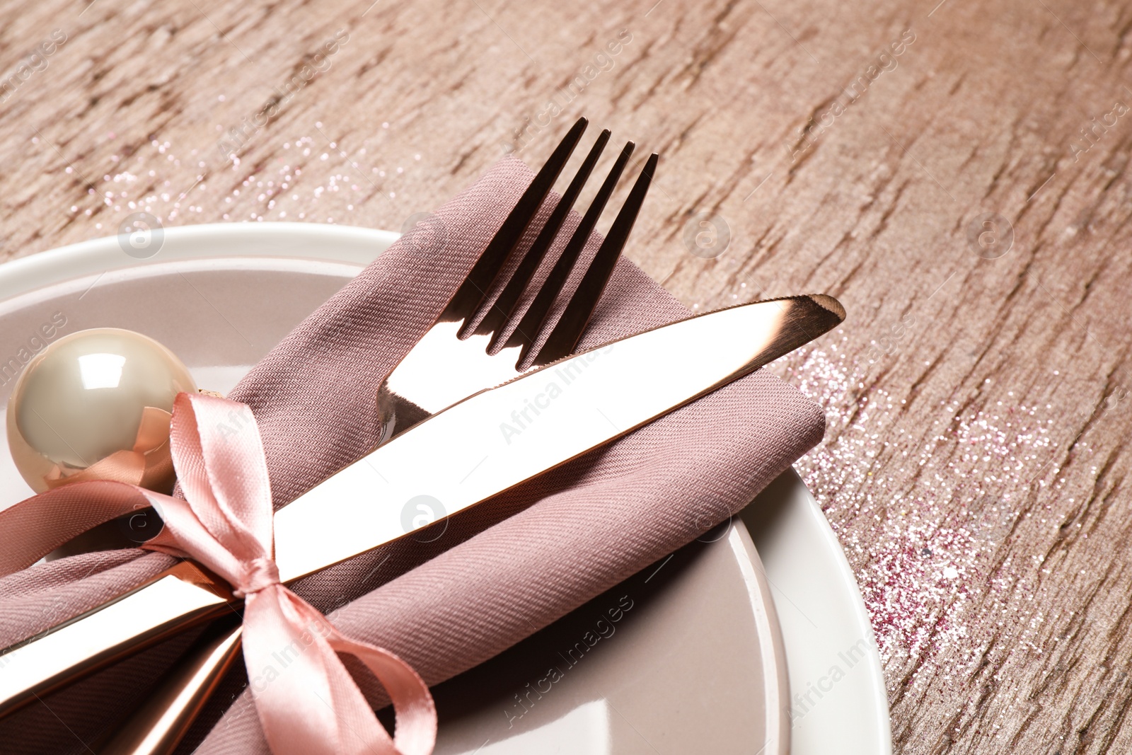 Photo of Beautiful Christmas table setting on brown background, closeup