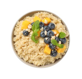 Photo of Tasty quinoa porridge with blueberries, pumpkin and mint in bowl isolated on white, top view