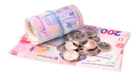 Photo of Ukrainian money on white background. National currency