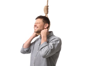 Depressed man with rope noose on neck against white background