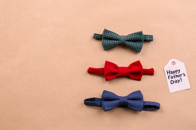 Photo of Bow ties on color background. Father's day celebration