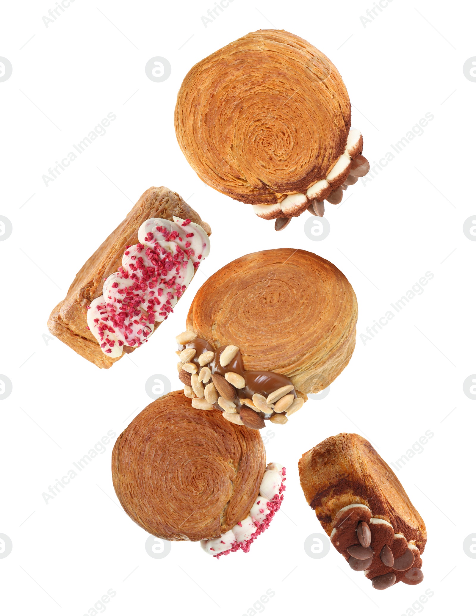 Image of Delicious round croissants in air on white background. Puff pastry