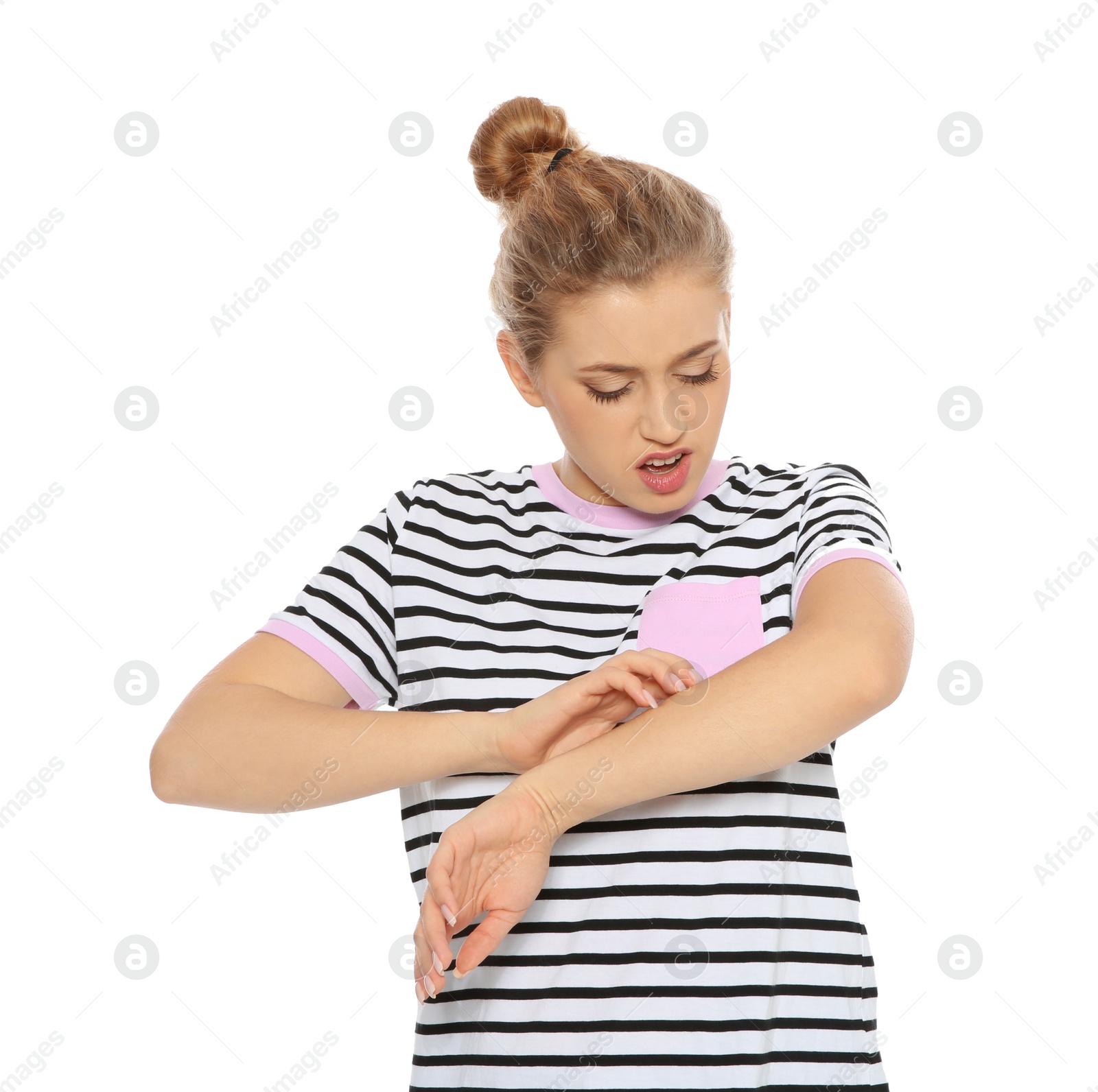Photo of Young woman scratching arm on white background. Annoying itch