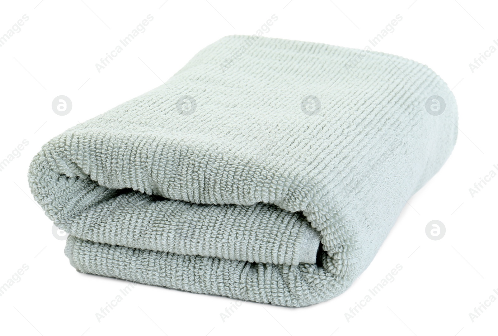 Photo of One soft folded towel isolated on white