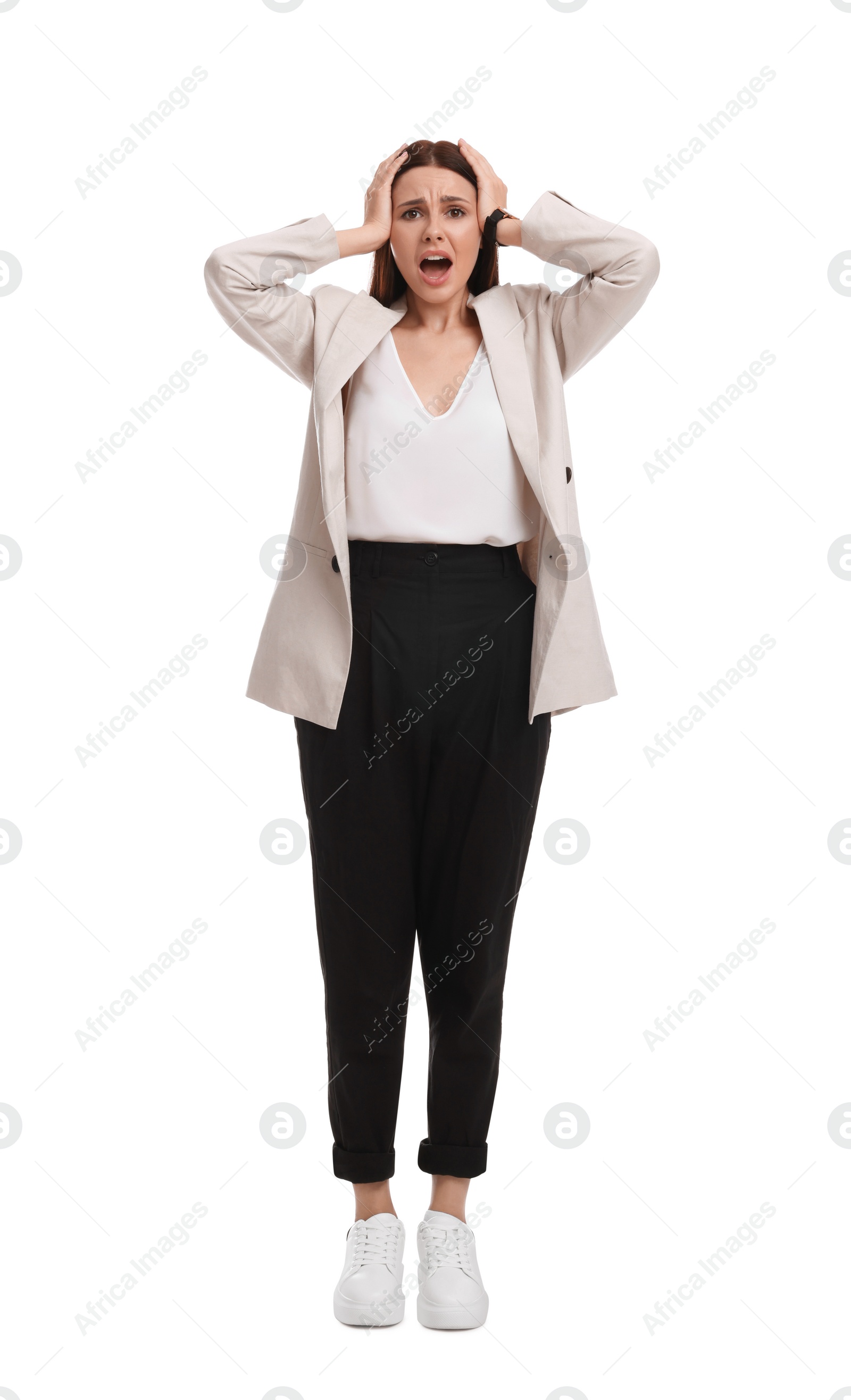 Photo of Beautiful emotional businesswoman in suit on white background