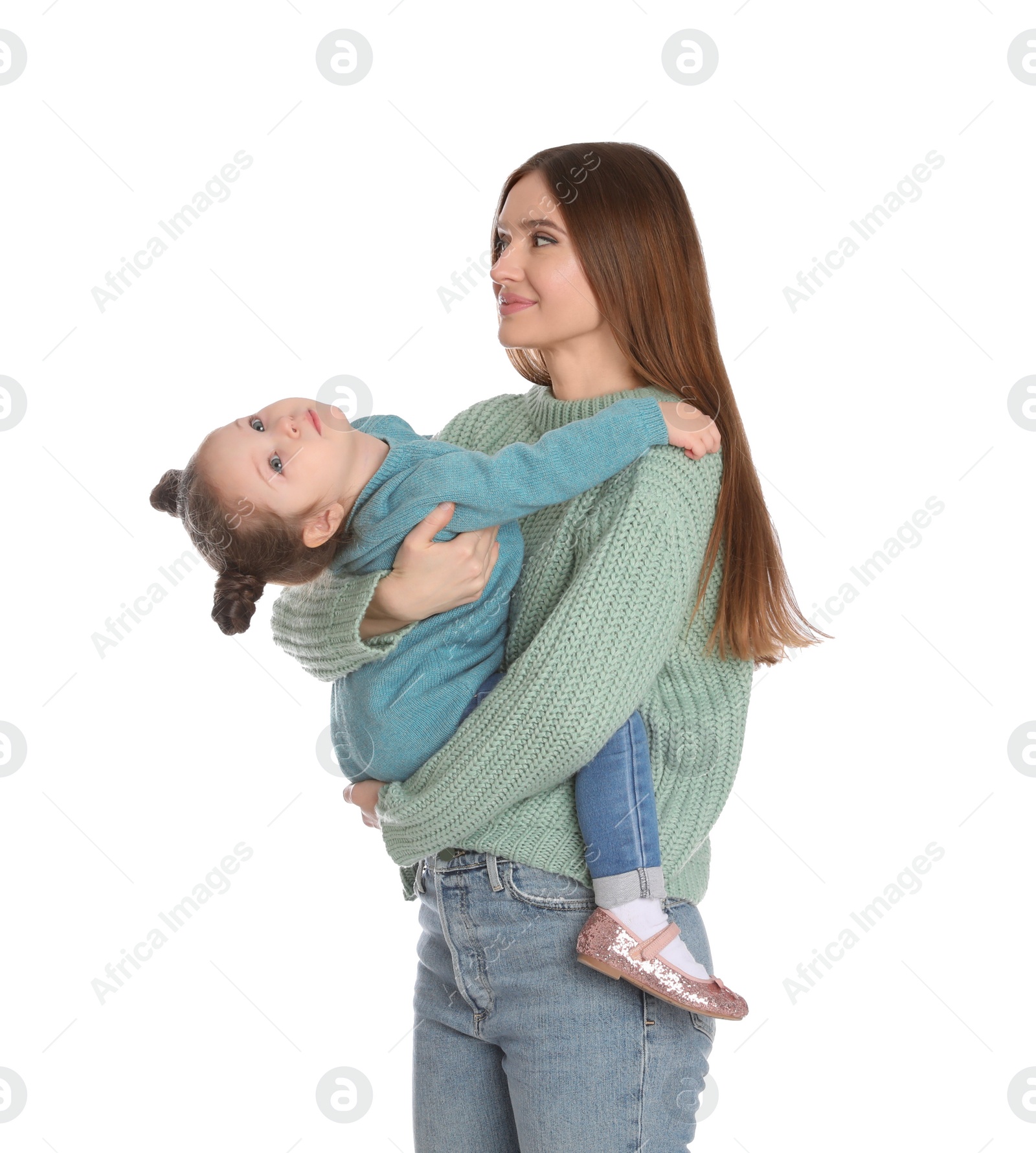 Photo of Young mother with little daughter on white background