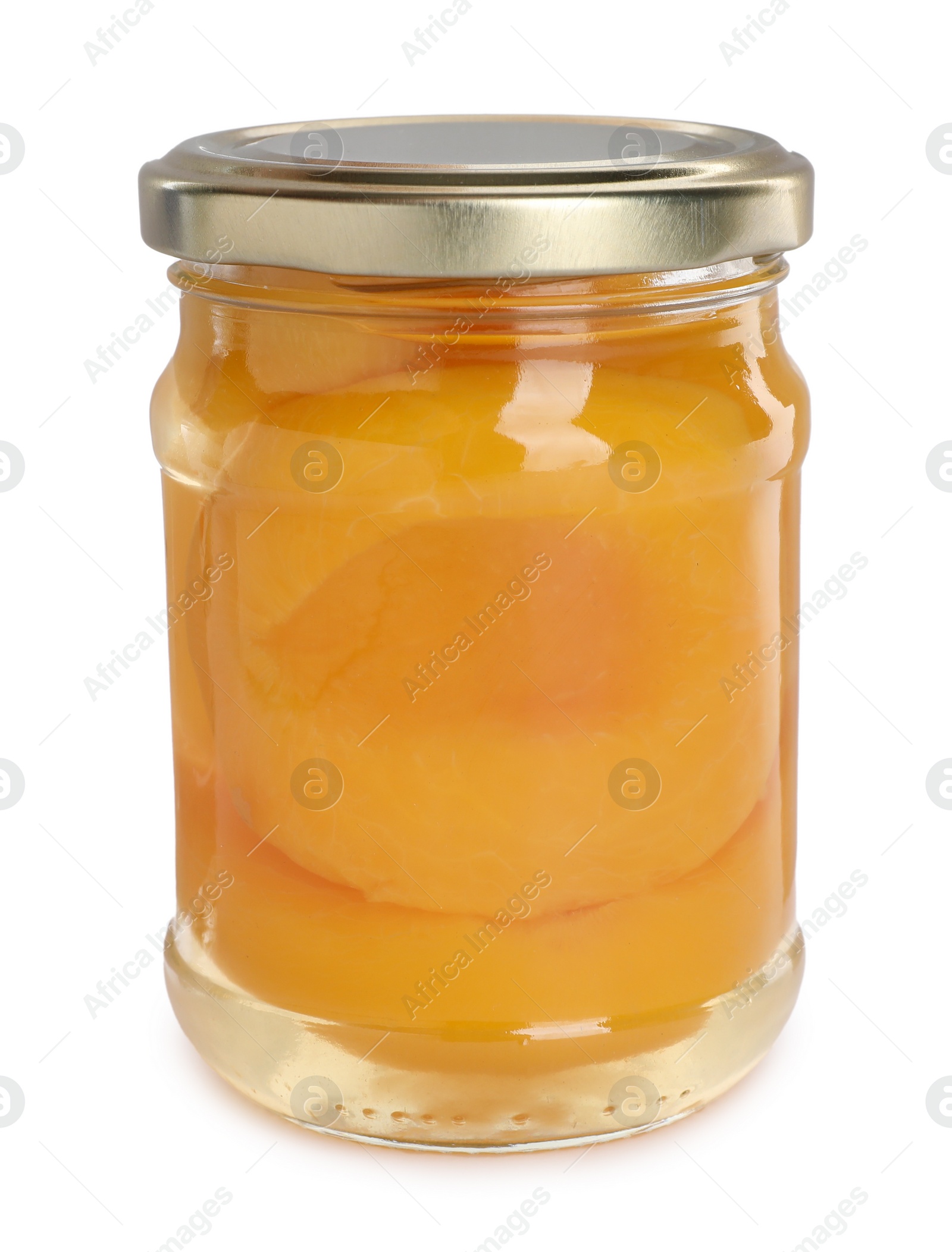 Photo of Glass jar with canned peach halves isolated on white