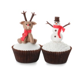 Photo of Beautiful Christmas cupcakes with snowman and reindeer on white background