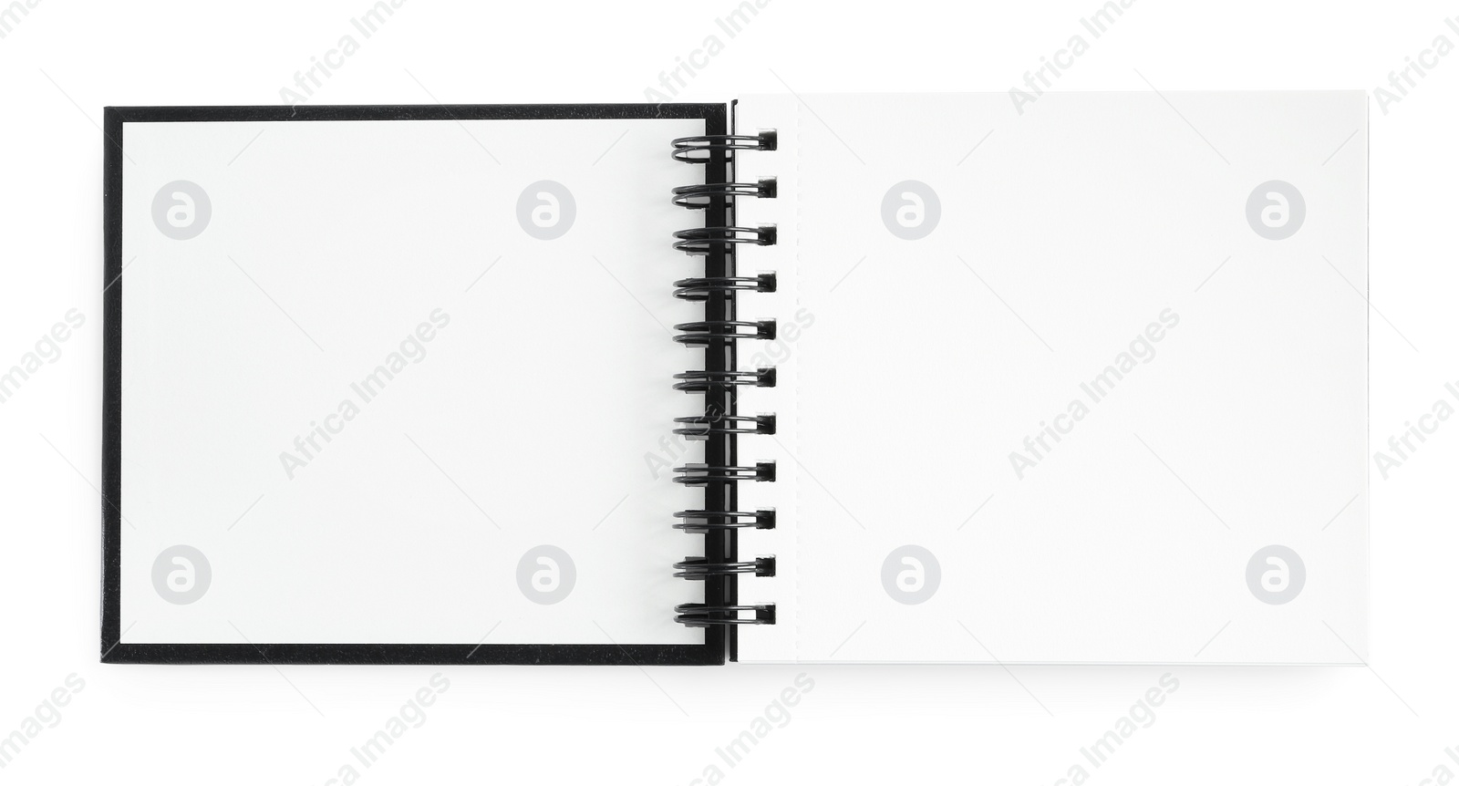 Photo of One notebook isolated on white, top view