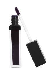 Photo of Dark lip gloss and applicator isolated on white. Cosmetic product