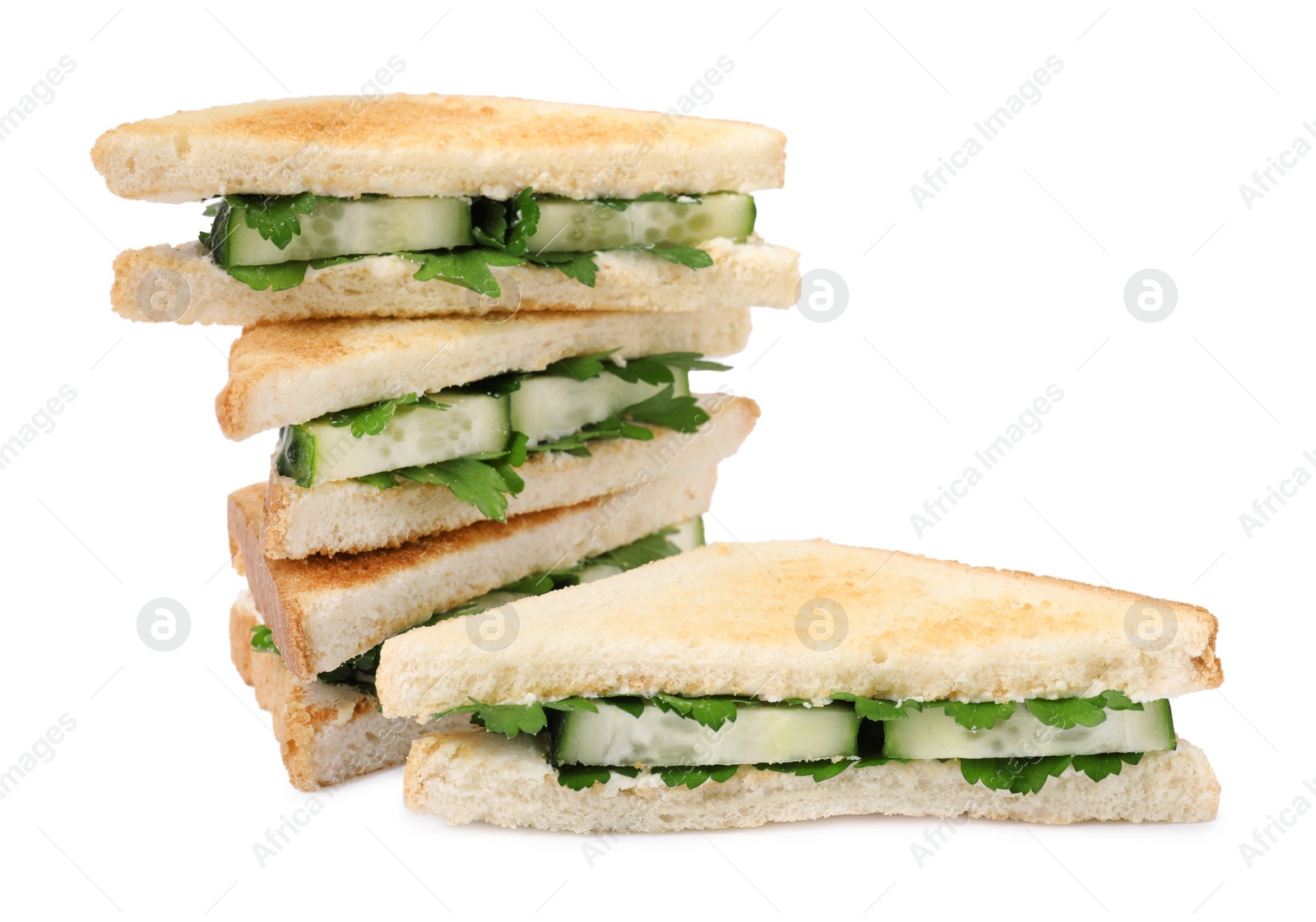 Photo of Tasty sandwiches with cucumber and parsley on white background