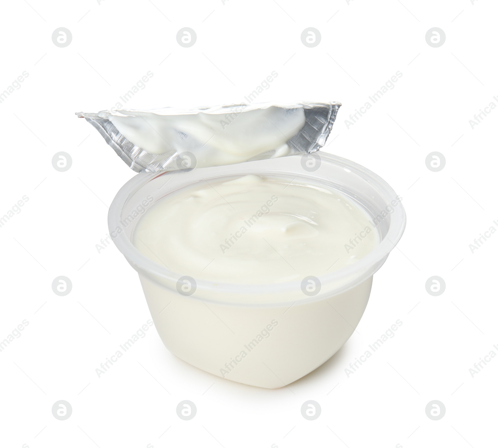 Photo of Plastic cup with creamy yogurt on white background