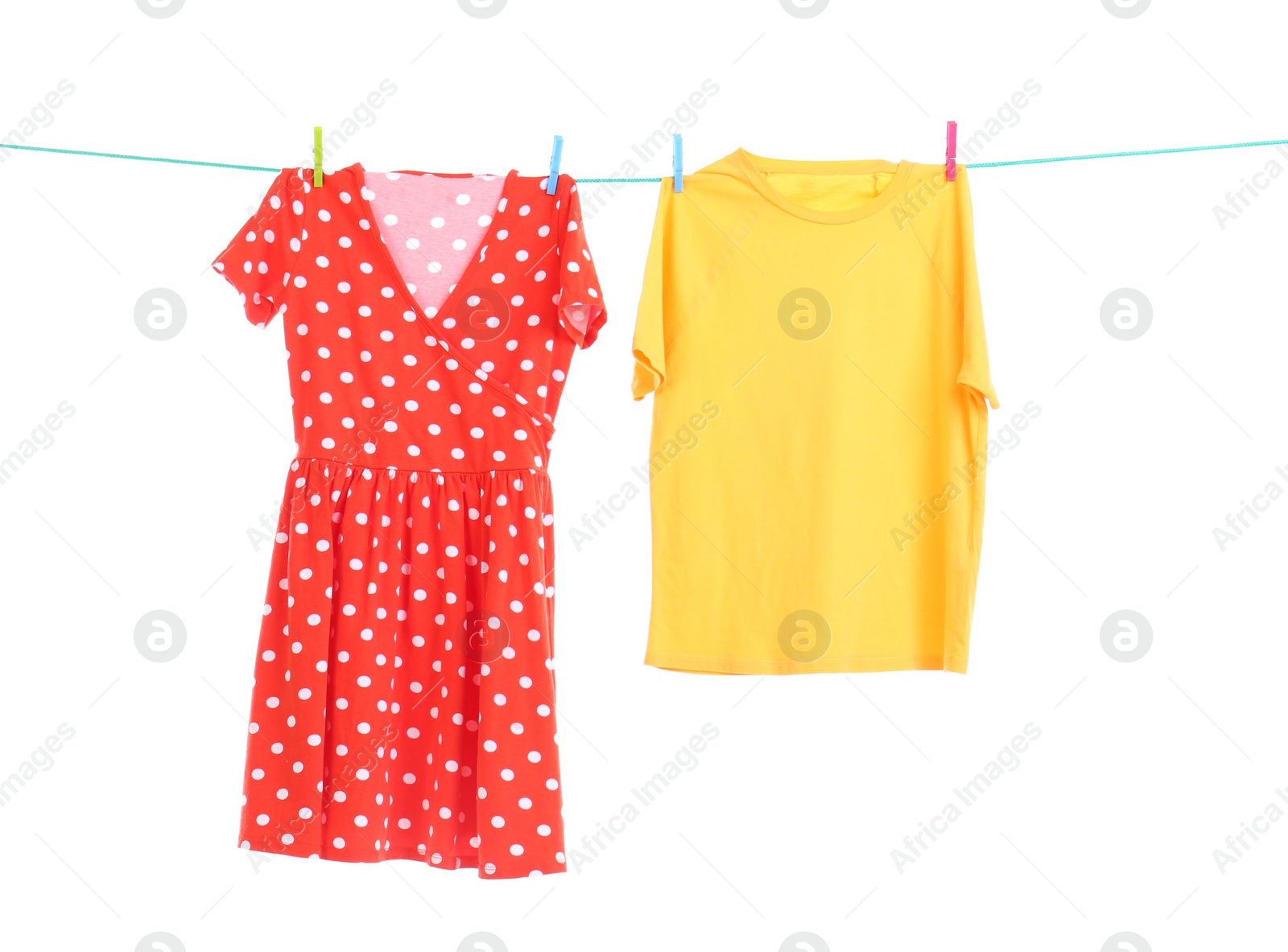 Photo of Clothes on laundry line against white background