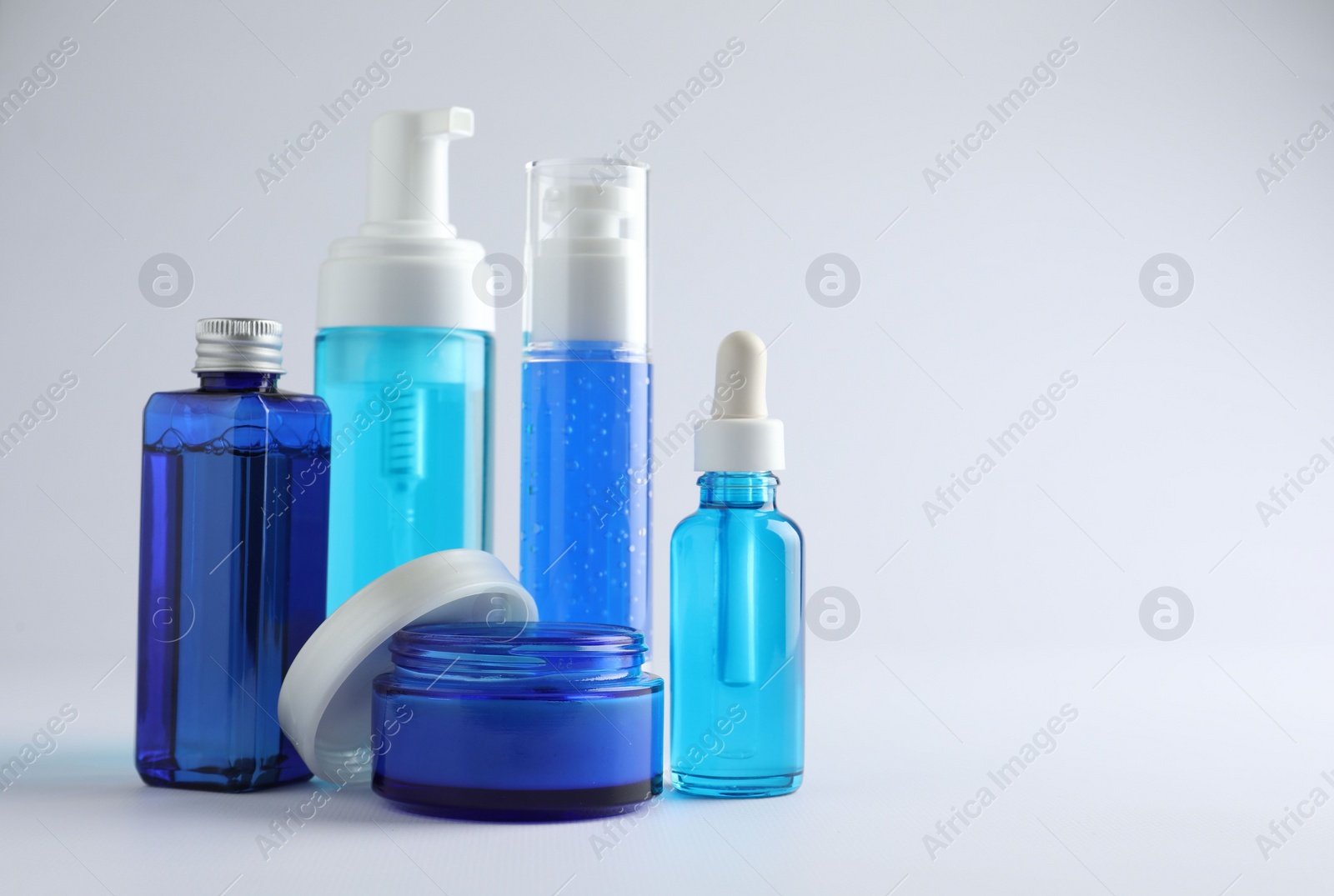 Photo of Set of luxury cosmetic products on white background. Space for text