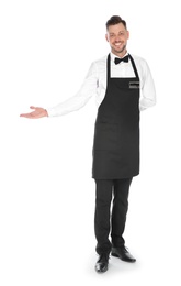 Photo of Full length portrait of handsome waiter in elegant uniform on white background