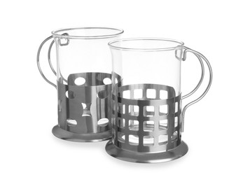 Photo of Traditional tea glass holders on white background