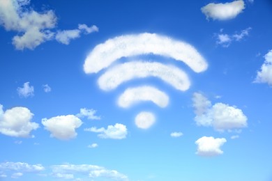 Image of Clouds in shape of WI-FI symbol against blue sky