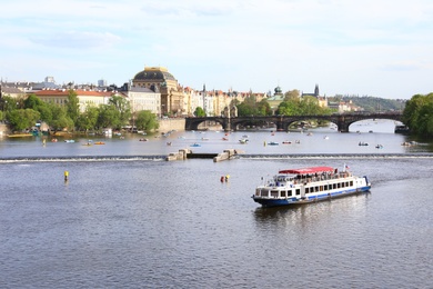 Photo of PRAGUE, CZECH REPUBLIC - APRIL 25, 2019: Cityscape with National Theatre and Legion Bridge on Vltava river