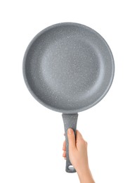 Woman holding new non-stick frying pan on white background, closeup