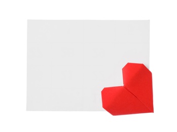 Photo of Blank card and red decorative heart on white background, top view. Valentine's Day celebration