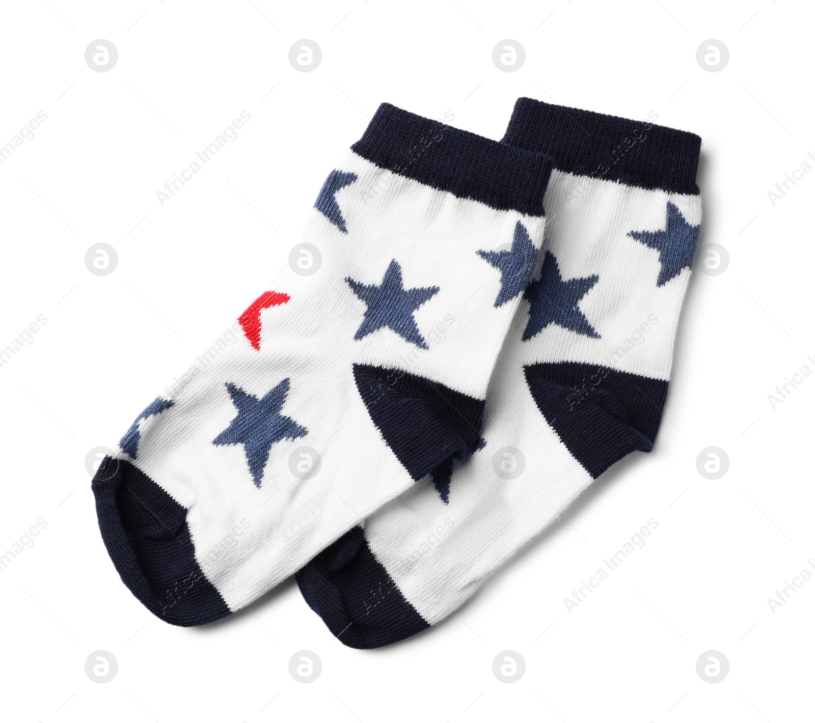 Photo of Cute child socks on white background, top view