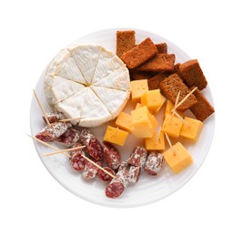 Photo of Toothpick appetizers. Tasty cheese, sausage and croutons on white background, top view