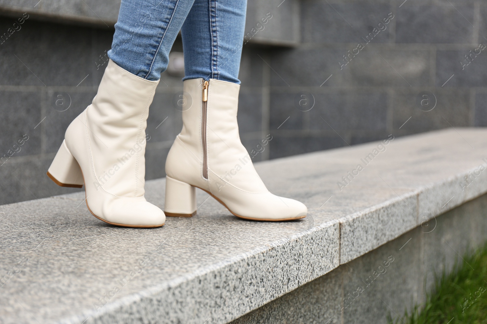 Photo of Woman wearing stylish leather shoes outdoors, closeup
