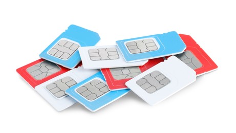 Photo of Pile of different SIM cards on white background