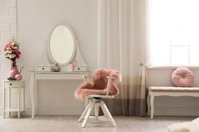 Photo of Stylish room interior with white dressing table